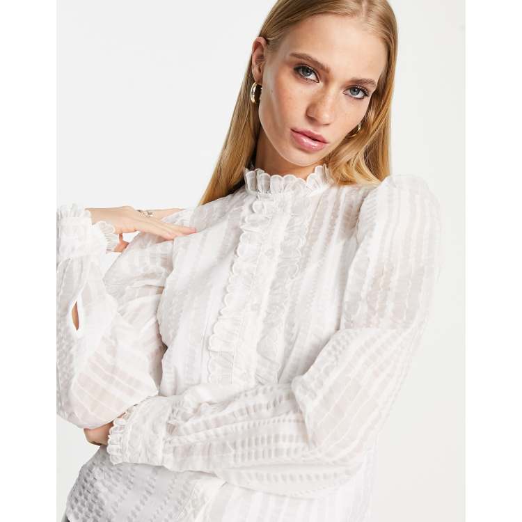 White high neck store ruffle blouse