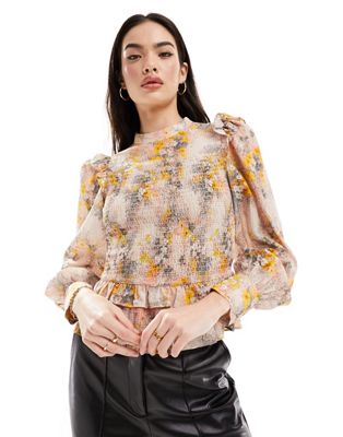 & Other Stories high neck long sleeve blouse with frill shoulder and volume sleeves in floral print