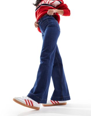 & Other Stories high rise flared jeans with patch pockets in dark blue wash