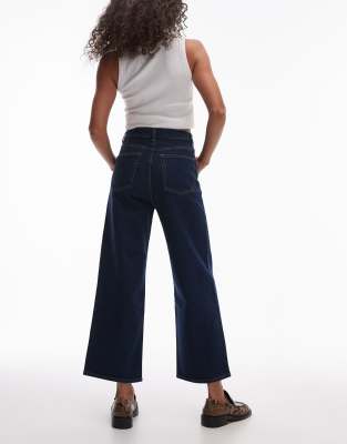 
Other Stories high rise flared jeans with patch pockets in dark blue wash