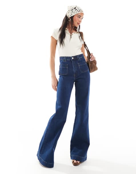 & Other Stories high rise flared jeans with patch pockets in dark blue wash - view 1