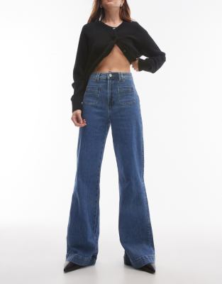 & Other Stories & Other Stories high rise flared jeans with patch pockets in mid blue wash