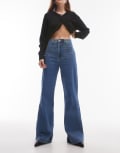 [Other Stories] & Other Stories high rise flared jeans with patch pockets in mid blue wash W25 Mid Blue