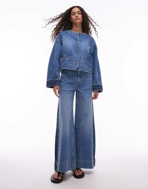 & Other Stories - Jeans met wijde pijpen, hoge taille en contrasterende zijpanelen in mid-wash blauw