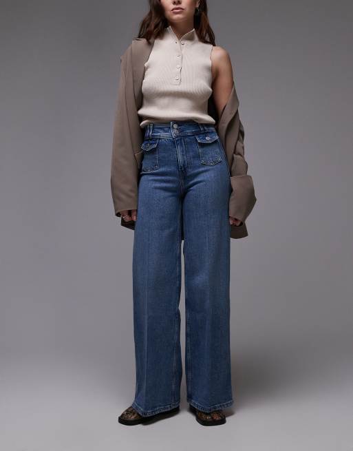 & Other Stories - Jeans met wijde pijpen, hoge taille, tailleband met dubbele knoop en zakdetail in mid-wash blauw 