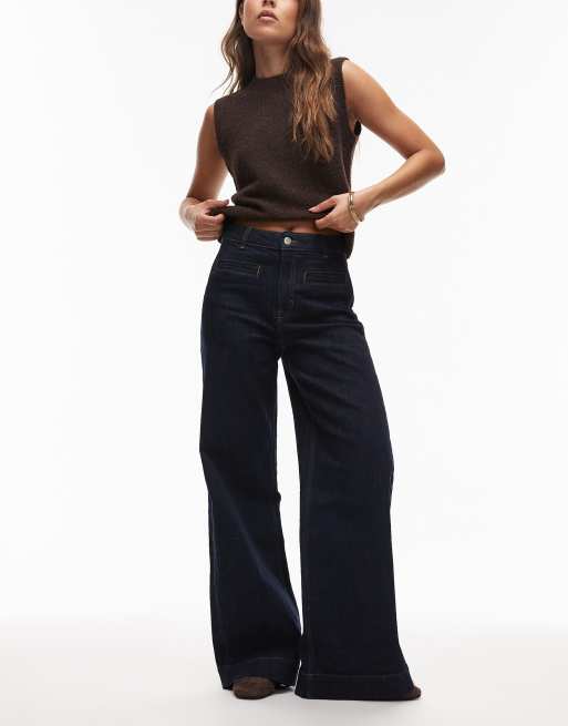 & Other Stories - Jeans met wijde ronde pijpen en jetzakken in donkerblauw met wassing