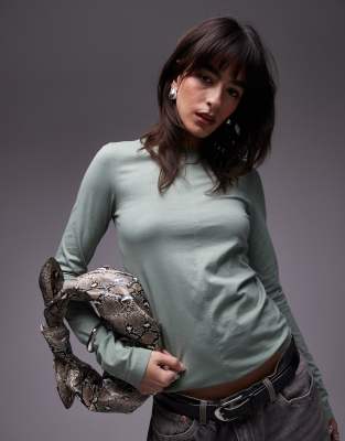 & Other Stories jersey fitted long sleeve top with front seam in soft green