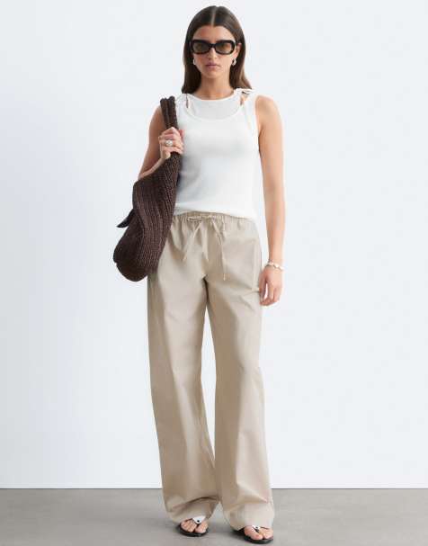 & Other Stories - Katoenen broek met wijde pijpen en elastische taille in beige - view 1