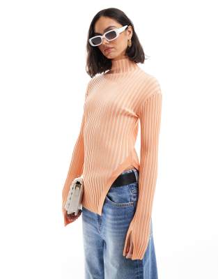 & Other Stories & Other Stories knitted rib fitted sweater with cut away hem detail in orange two tone