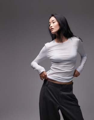 & Other Stories - Langärmliges Oberteil in transparentem Blau