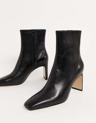 black leather almond toe booties