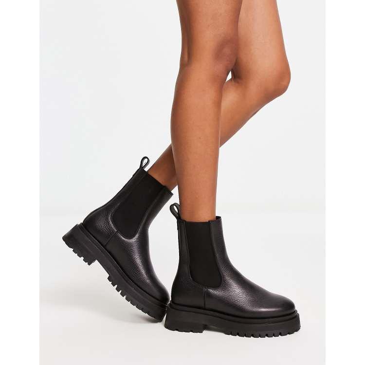 Black flat chunky on sale boots