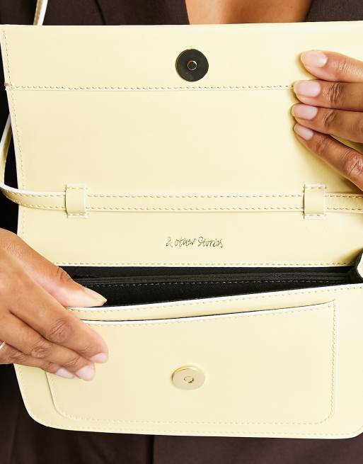 Other Stories leather fold over cross body bag in yellow