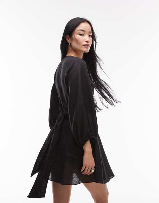 & Other Stories – Leinen-Minikleid in Schwarz mit Puffärmeln und gewickelter Vorderseite, 4 von 4