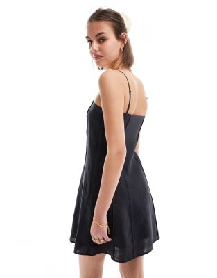 & Other Stories Linen Mini Flippy Dress With Adjustable Straps And Paneled Seams In Black