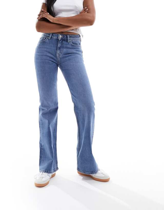 & Other Stories - low rise flared jeans in mid blue wash