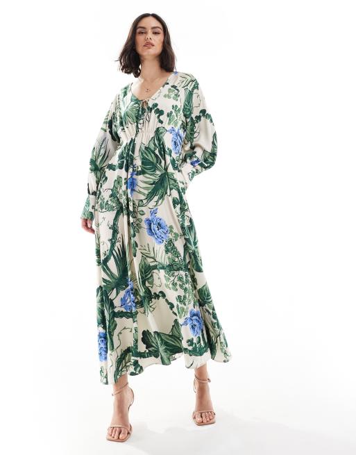 & Other Stories maxi dress with tie front v-neckline and long sleeves in floral leaf print