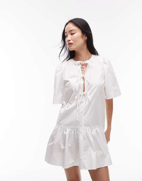 & Other Stories - Mini jurk met verlaagde taille en gestrikte voorkant in wit - view 1