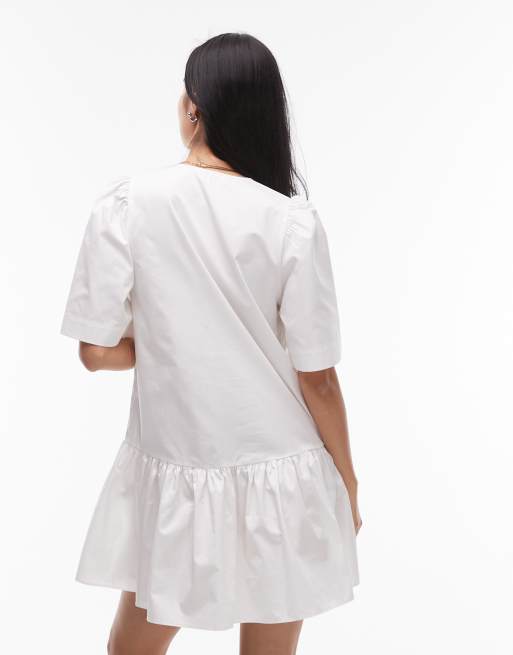 & Other Stories - Mini jurk met verlaagde taille en gestrikte voorkant in wit, 4 van 4
