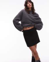 ARKET sculptural flippy mini skirt in black