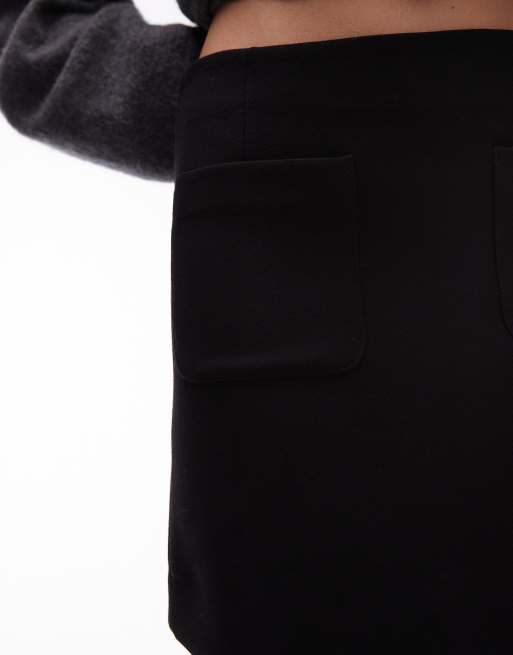 & Other Stories mini skirt with front patch pockets in black, 5 of 5