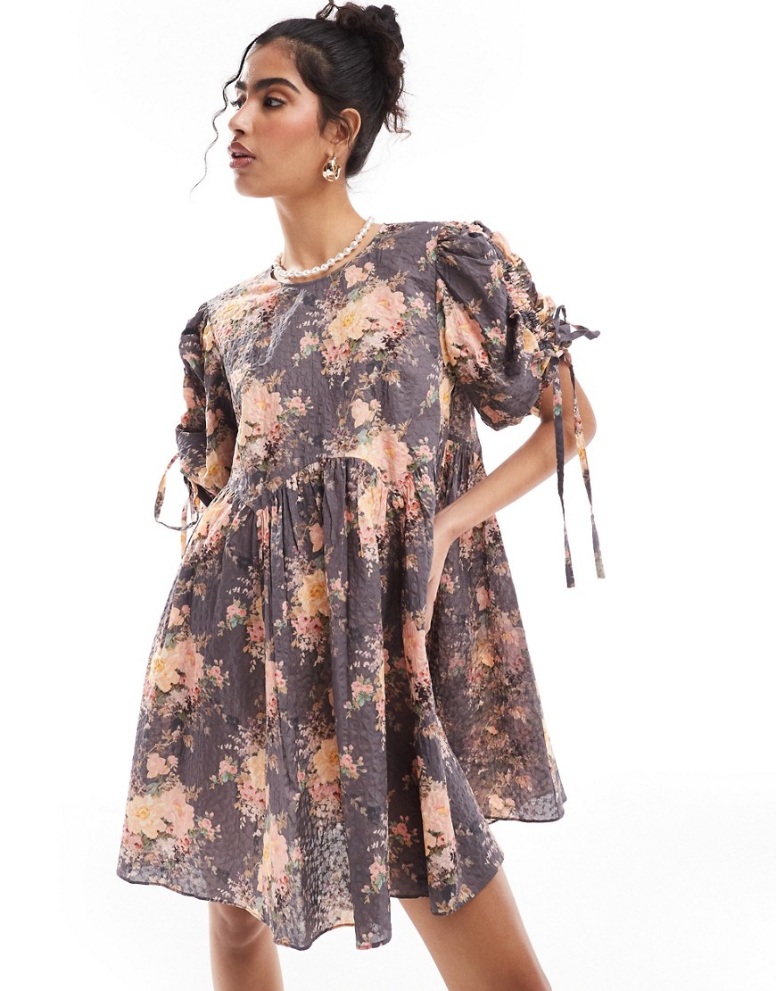 & Other Stories mini smock dress with tie detail volume sleeves in textured floral print-Multi