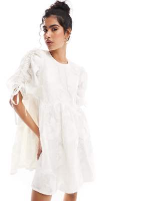 & Other Stories mini smock dress with tie detail volume sleeves in white jacquard