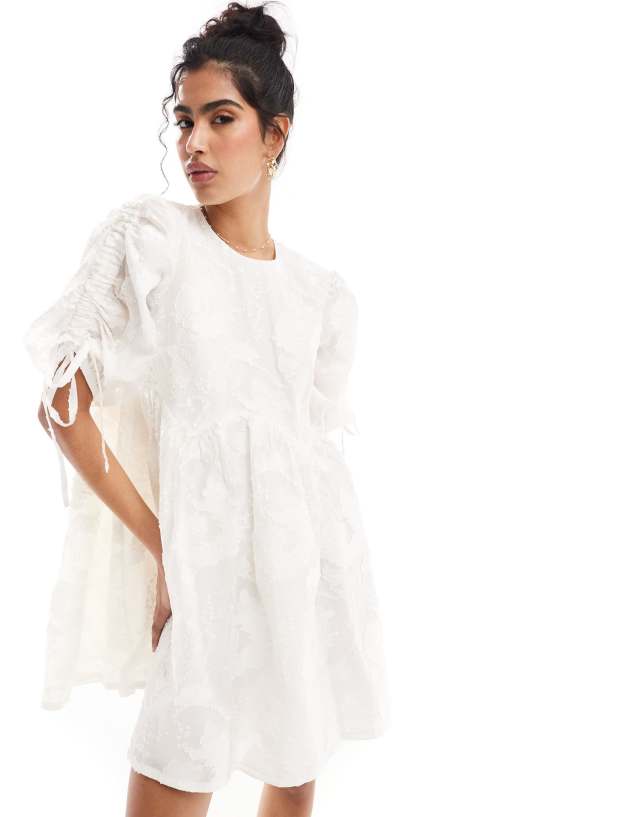 & Other Stories - mini smock dress with tie detail volume sleeves in white jacquard