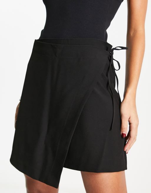 buste Mainstream rekenmachine & Other Stories mini wrap skirt in black | ASOS