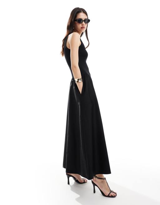 & Other Stories - Mouwloze maxi jurk met volumineuze zoom in zwart gemengd jersey en geweven stof