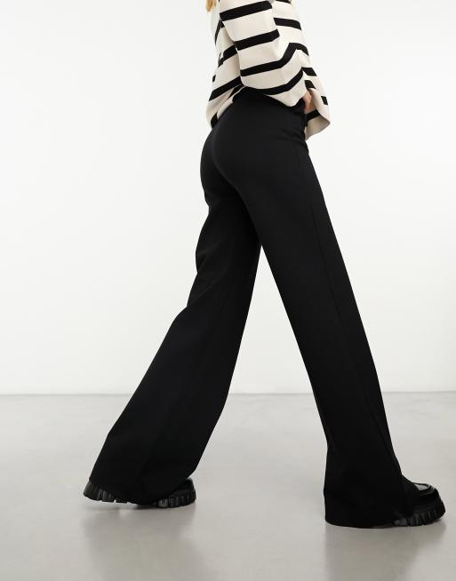 Pantalon évasé noir online taille haute