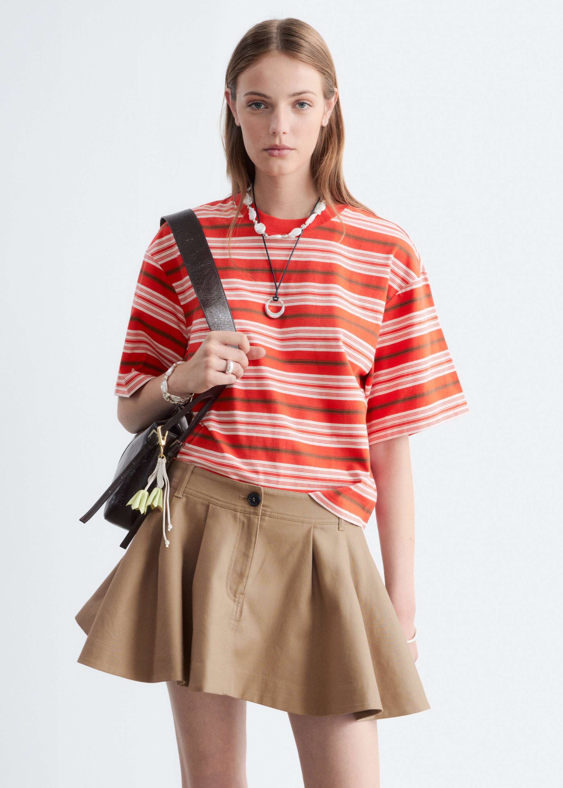 & other stories pleated mini skirt in light beige