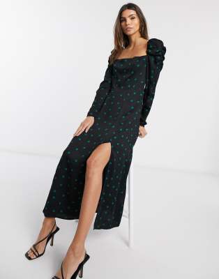 black spotty midi dress