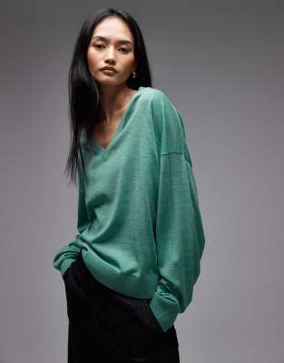 & Other Stories - Pullover in Türkisblau mit hohem Wollanteil und V-Ausschnitt