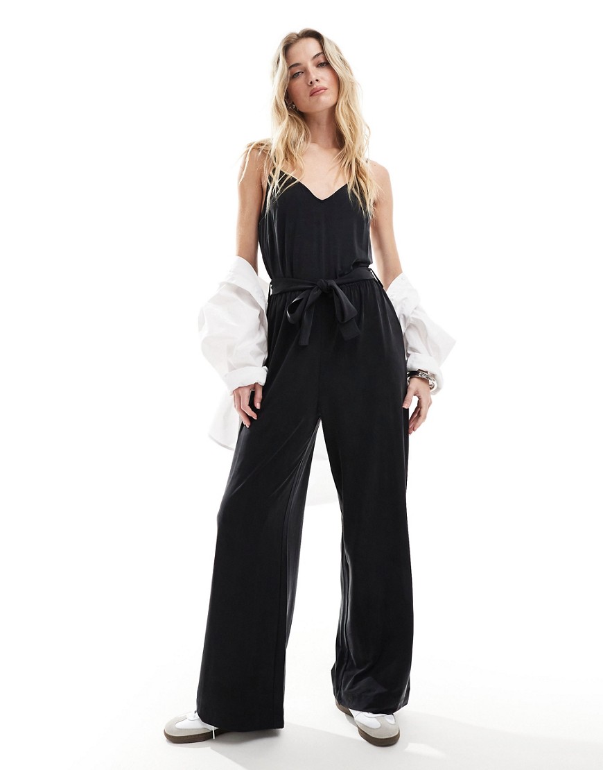 & Other Stories relaxed leg stretch jumpsuit with camisole straps and tie waist in black