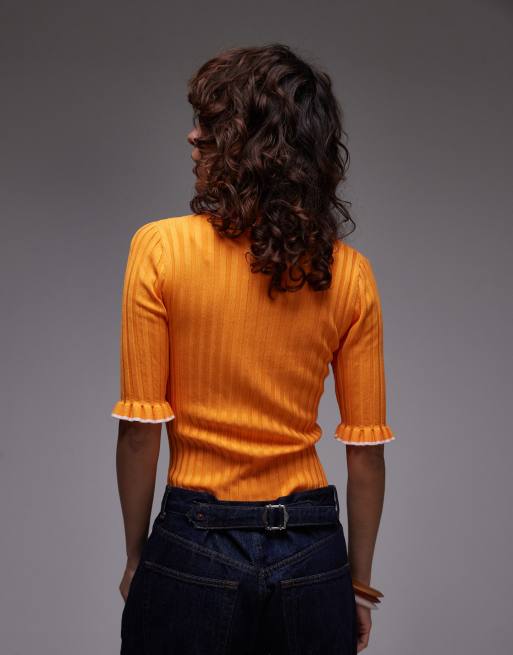 & Other Stories rib knit polo top with short sleeves in orange with contrast frill trim