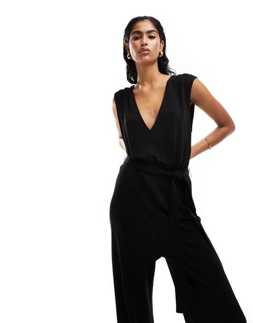 & Other Stories - Ærmeløst jumpsuit med V-front, åben ryg og bindebånd i taljen i sort, 3 af 4