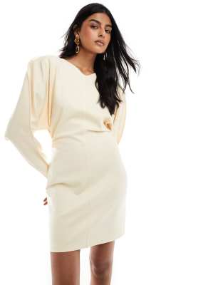 Robe courte en jersey avec manches volumineuses et encolure bateau en V - clair - Other Stories - Modalova