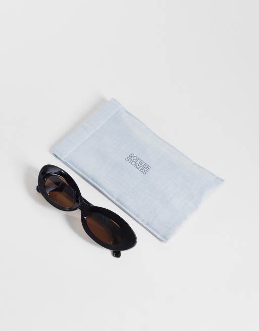 & Other Stories rounded cat eye style sunglasses in black and dark tinted lenses with linen pouch case, 3 of 3