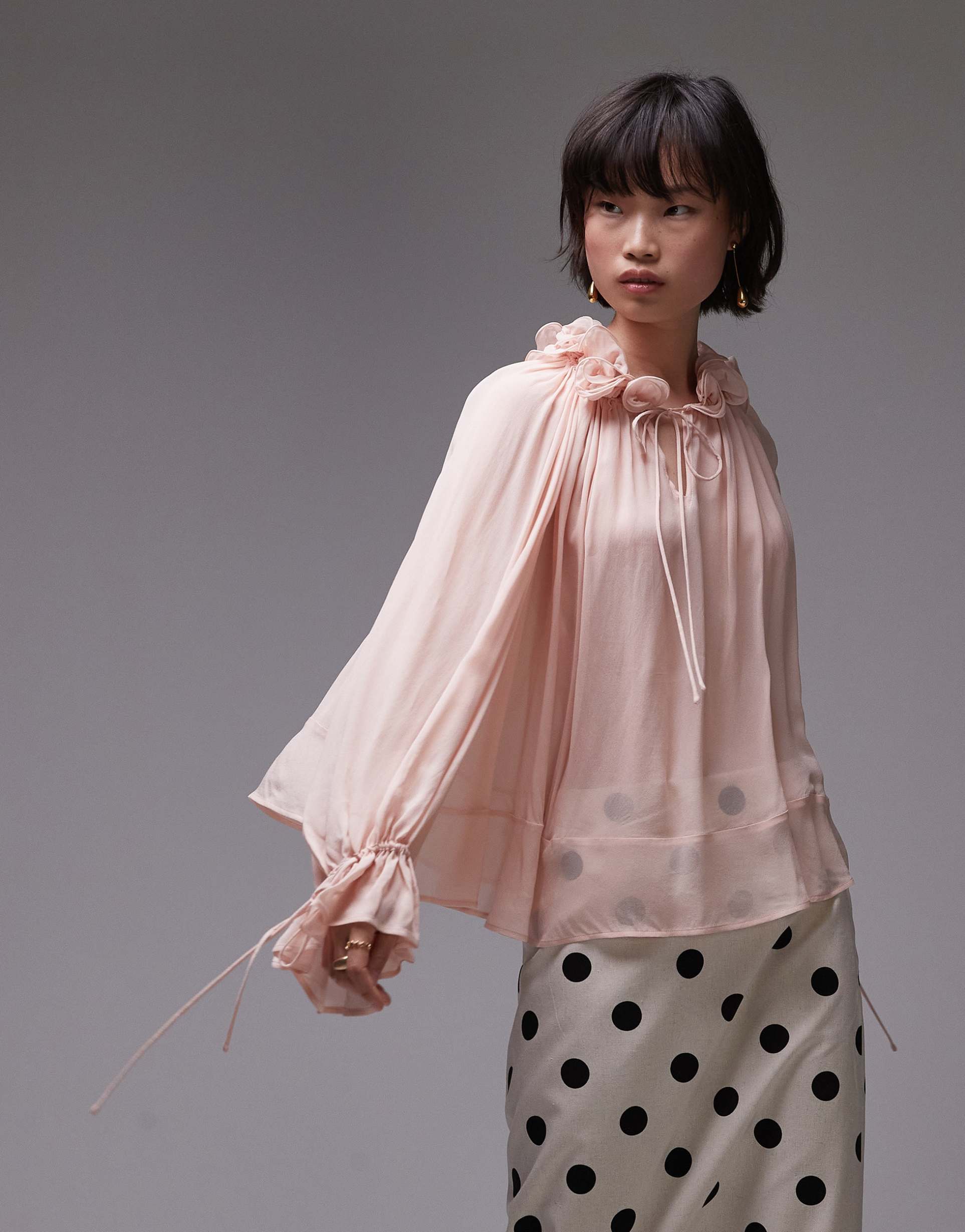 & other stories sheer blouse with ruffled neckline and volume sleeves in light pink