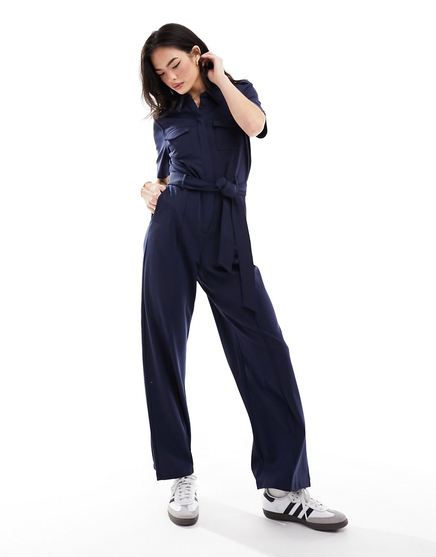 & Other Stories short sleeve jersey jumpsuit with patch pockets and tie waist in dark blue