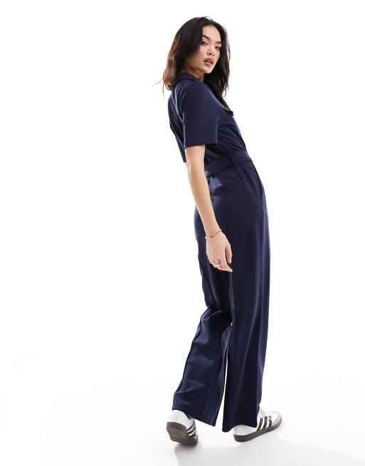 & Other Stories short sleeve jersey jumpsuit with patch pockets and tie  waist in dark blue