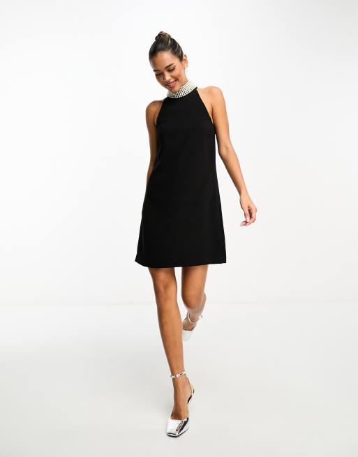 Black dress with pearls sales on neckline