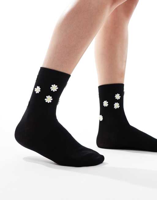 & Other Stories – Socken in Schwarz mit 3D-Gänseblümchen