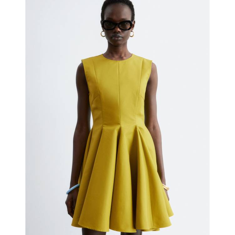 & Other Stories structured mini dress with circle skirt in green | ASOS