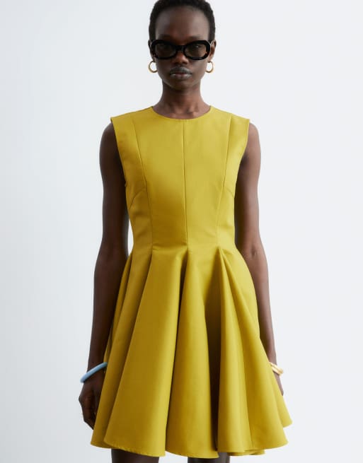 green structured mini dress EMERALD CITY MINI DRESS – AKIRA main image 1
