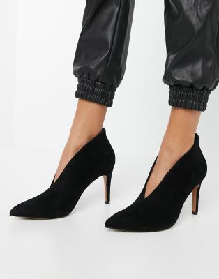 black heeled shoe boots