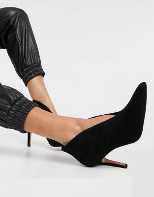 black heeled shoe boots