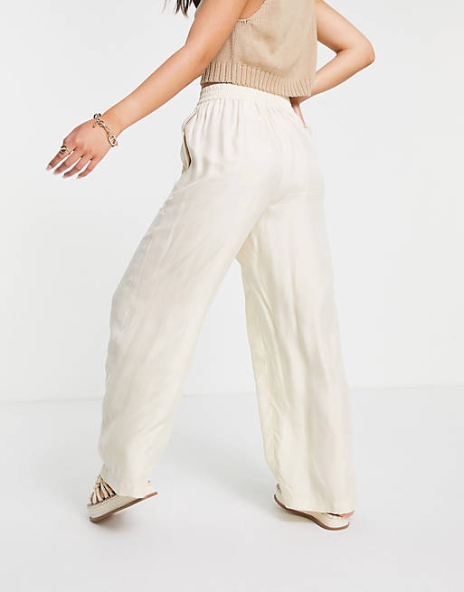 Women & Other Stories super soft cupro trousers in beige 