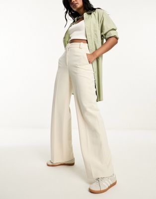 & Other Stories tailored flared trousers in beige - ASOS Price Checker